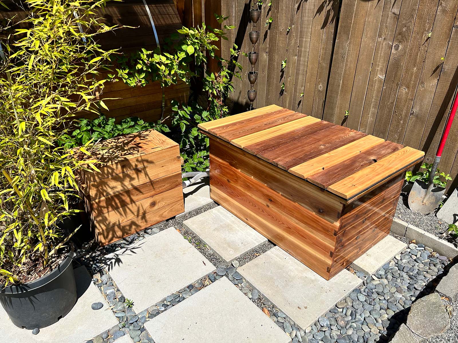 Rectangular outdoor cedar hot tub in tight-knot Western Red Cedar with spa system box and cedar roll top lid.