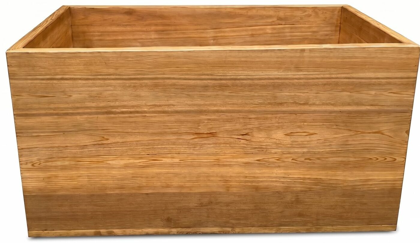 Finished western red cedar tub in clear mixed grain, showing warm amber-brown color with cathedral figure and straight grain